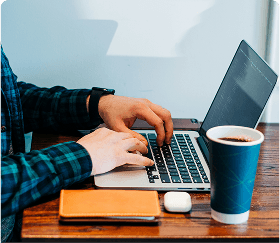 Man typing on laptop